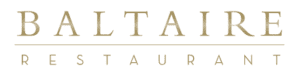 travis-strickland-logo-baltaire Logo of Baltaire Restaurant featuring the name in large, elegant serif font. A thin horizontal line separates the larger word "BALTAIRE" from the smaller "RESTAURANT" below. The muted gold text on a white background reflects their support for Los Angeles Regional Food Bank’s community efforts.