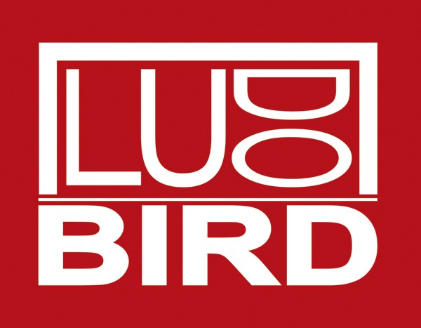 ludo-lefebvre-logo-ludo-bird Logo featuring the word "LUCK" in stylized white capital letters, with the letters "LU" at the top and "CK" as abstract shapes beneath it. Below that is a bold white "BIRD," resembling the spirit of generosity found at the Los Angeles Regional Food Bank, all set against a solid red background.