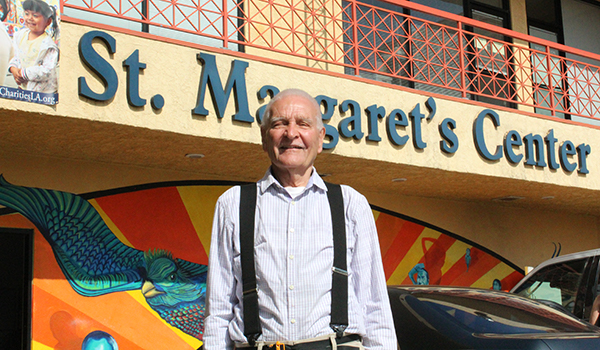 Wayne standing in front of St. Margaret's Center