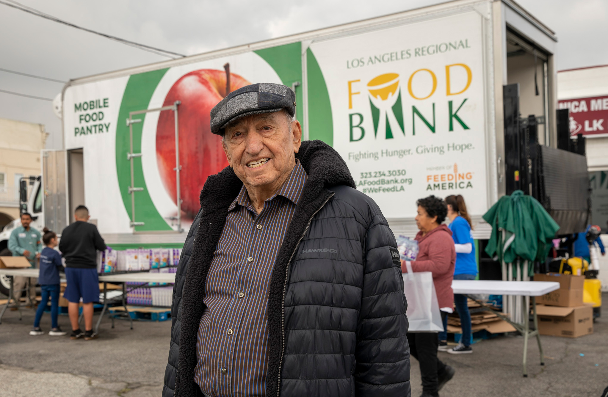 200121-MFP-Clinic-940 older man in front of Food Bank truck