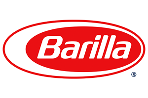 barilla-logo The Barilla logo, displayed prominently on a Los Angeles Regional Food Bank banner, showcases the brand name in white text inside a red oval, bordered by a sleek white band and thicker red outline.