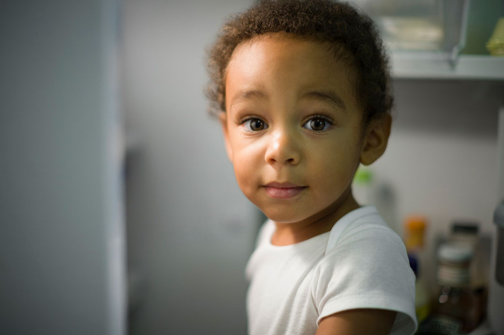 Young boy at fridge