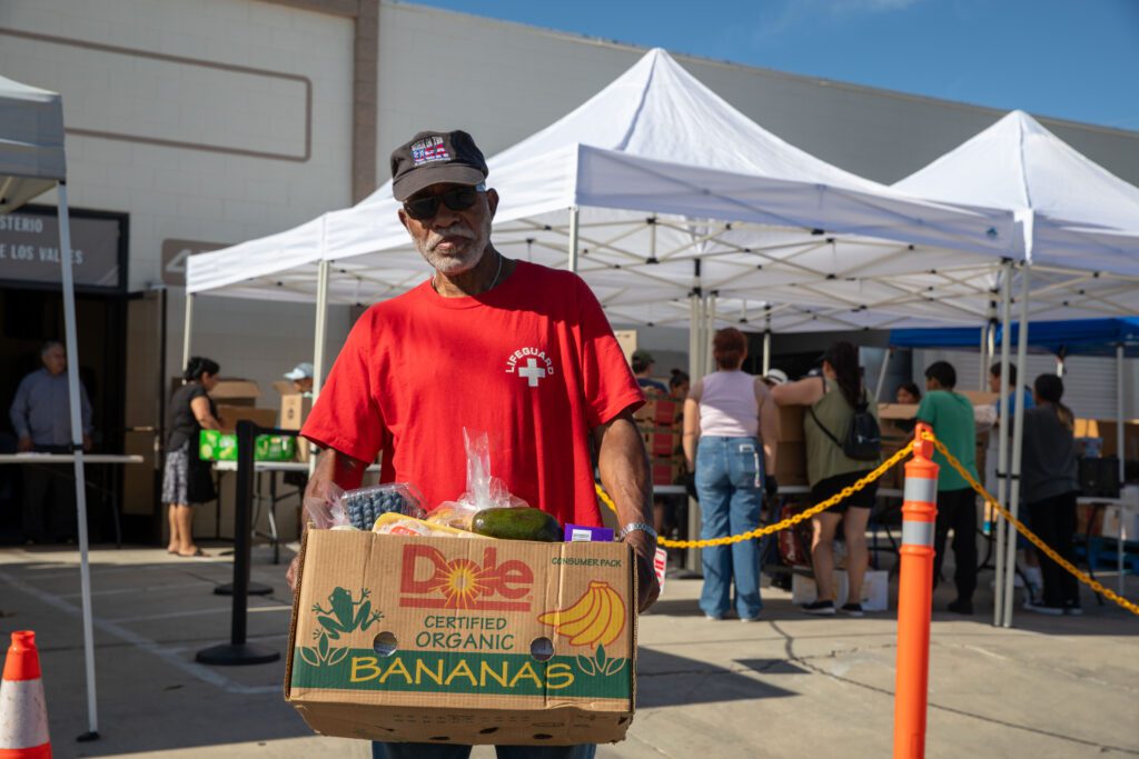 Samuel Williams, food recipient at Iglesia El Lirio de los Valles in Lancaster
