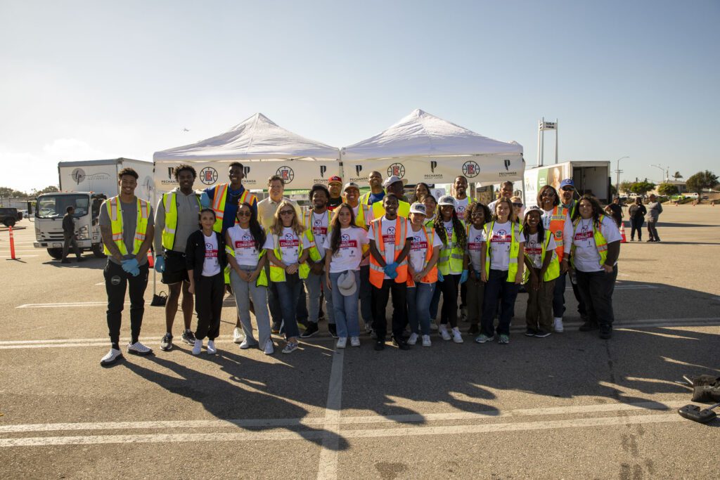 Los Angeles Clippers players, staff and volunteers at the 2023 Feed the Community event at The Kia Forum in Inglewood.