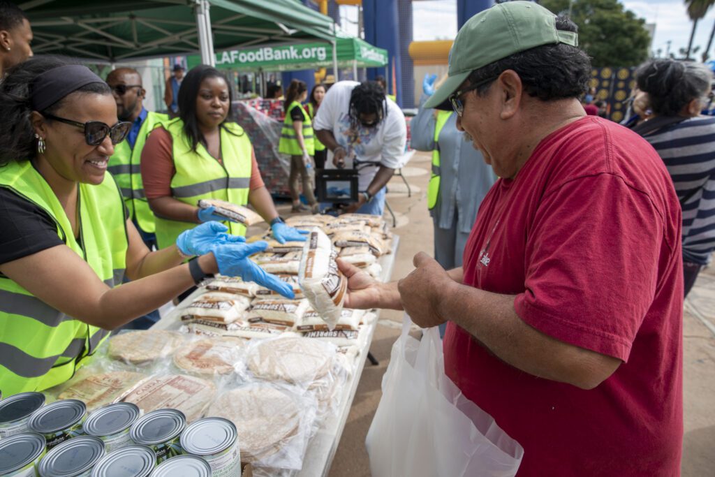 LA Rams, It's Bigger Than Us, Pepsi and the Food Bank join forces for a food distribution in Leimert Park.