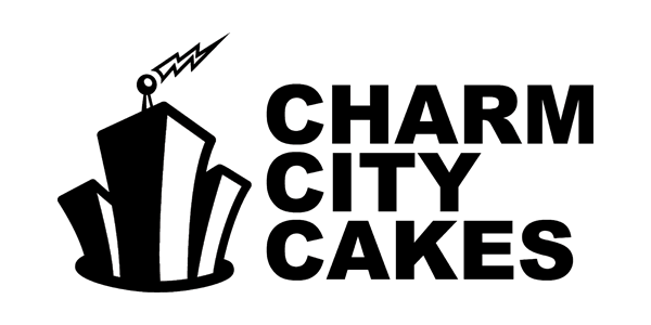 BOB-Party-2017-CharmCityCakes-logo The logo of Charm City Cakes showcases a stylized black and white skyscraper with a small lightning bolt on top, placed beside bold, black letters spelling "Charm City Cakes." The green background subtly nods to community efforts like those of the Los Angeles Regional Food Bank.
