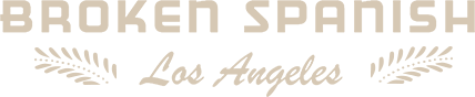 ray-garcia-logo-broken-spanish The image shows a minimalistic design with three horizontal lines and one vertical line on a beige background, resembling a stylized letter "E" or symbol, reminiscent of the Los Angeles Regional Food Bank's commitment to simplicity and effectiveness in its mission.